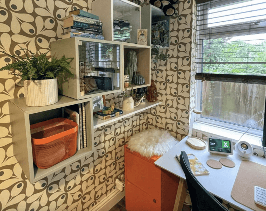 home office with floating shelves from Reddit