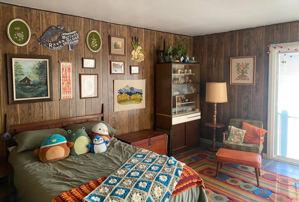 bedroom with wood paneling