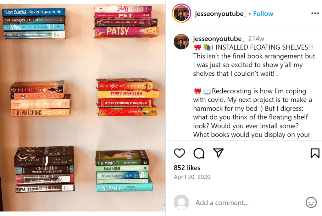 Six small stacks of book placed on invisible floating shelves on a tan wall. 