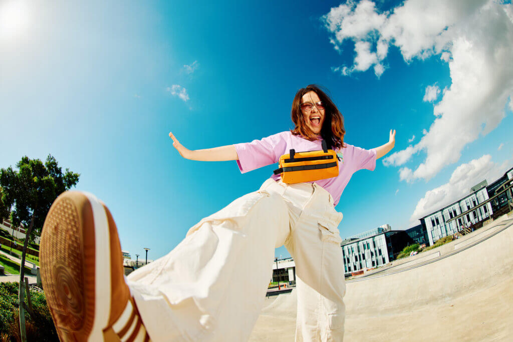 Gen Z teenager poses full body towards camera, showing attitude