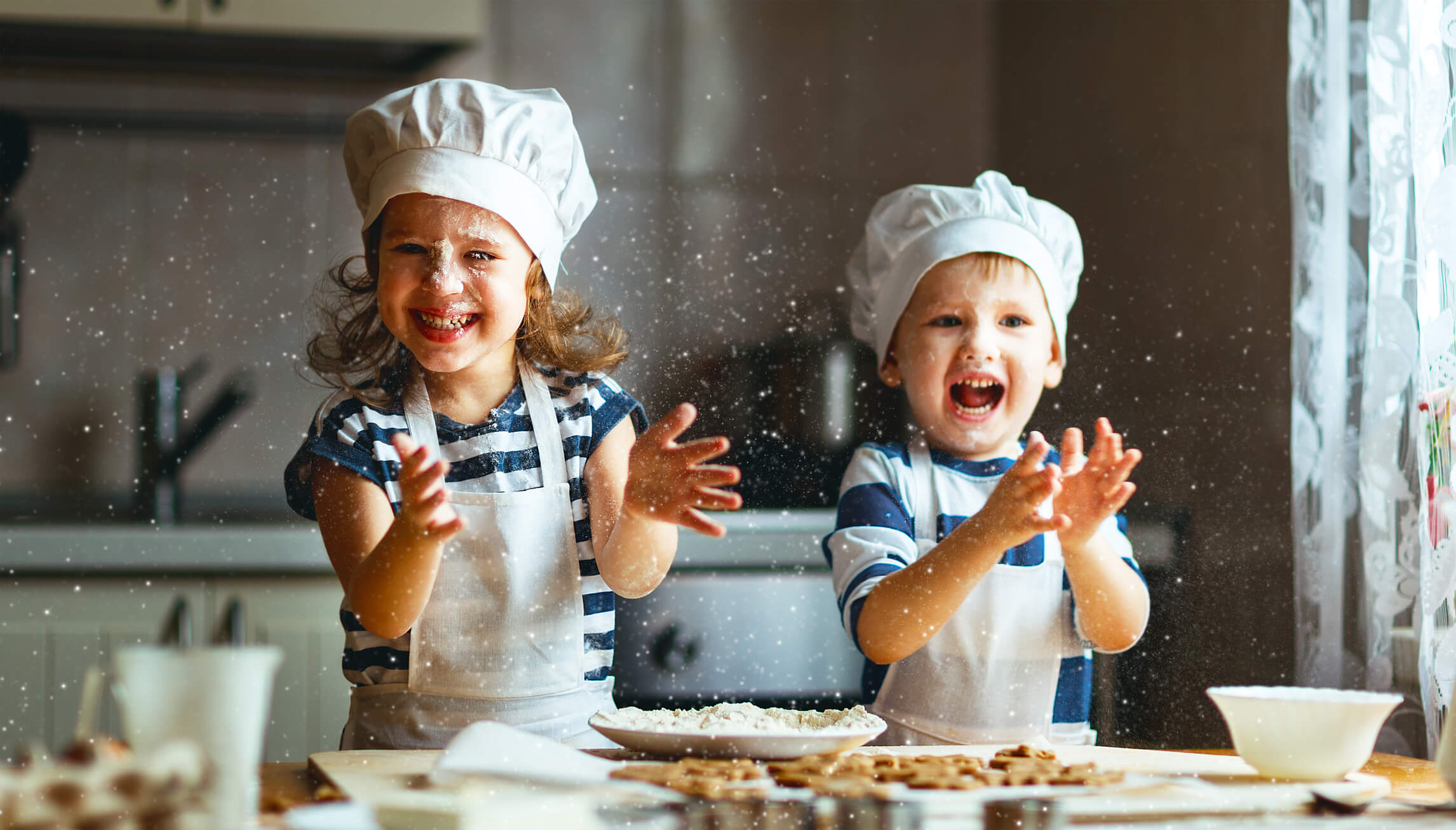 happy family funny kids are preparing the dough, bake cookies in the kitchen