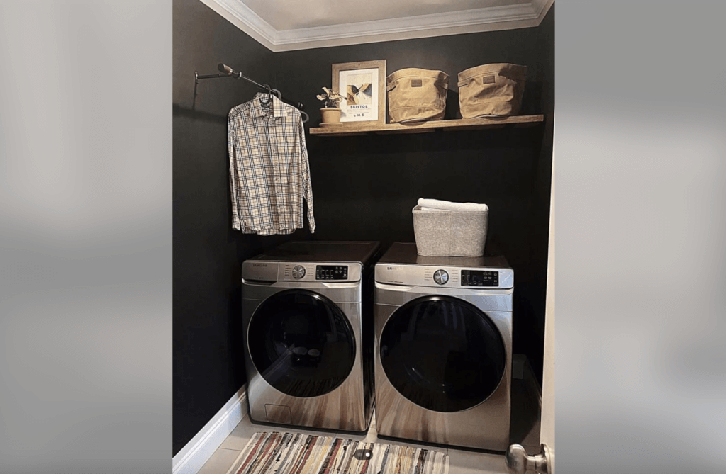 laundry room with black walls