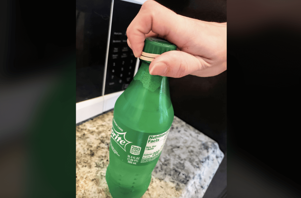 rubber band around sprite bottle cap