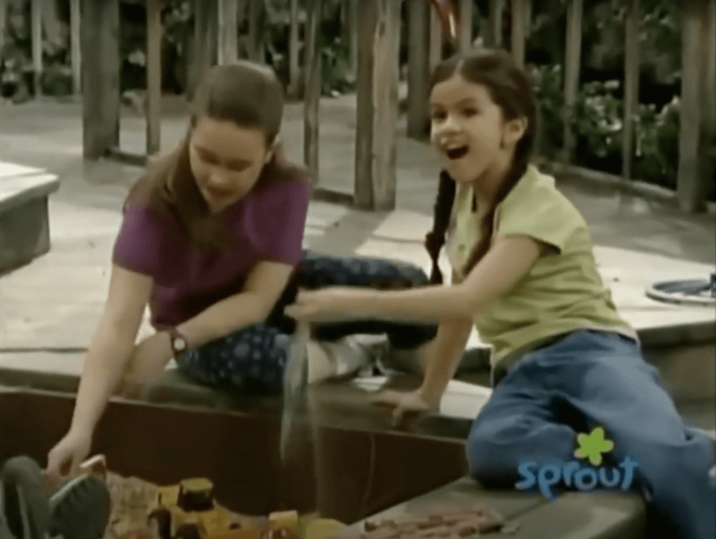 Selena Gomez and Demi Lovato as children on the set of Barney & Friends