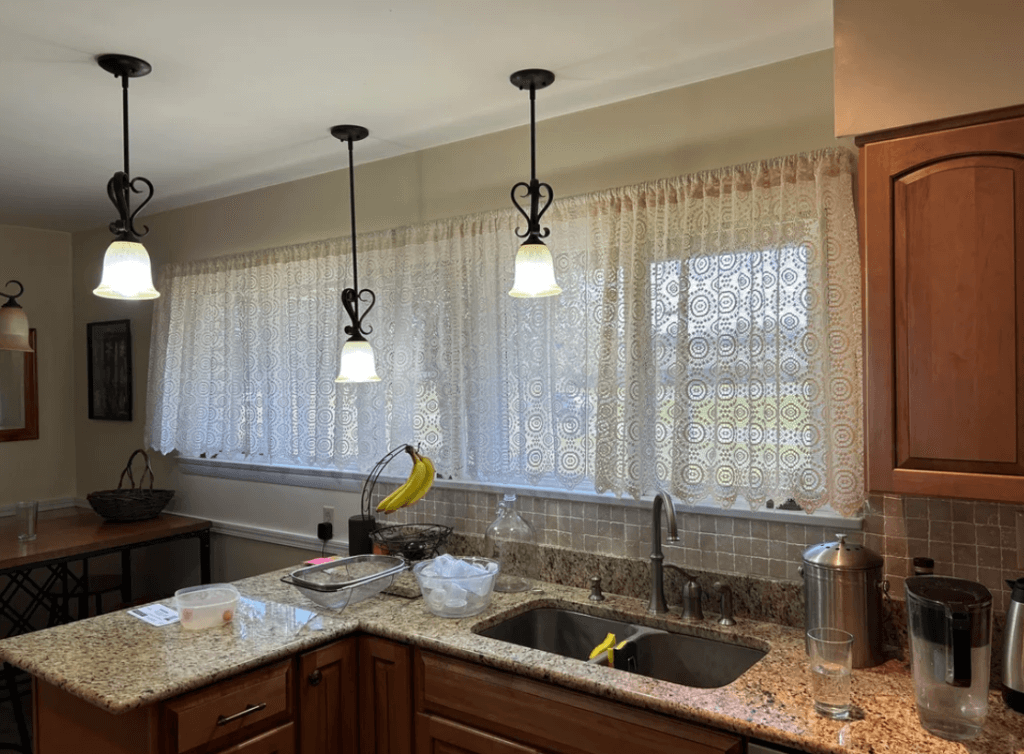 2000s lace curtains in a kitchen