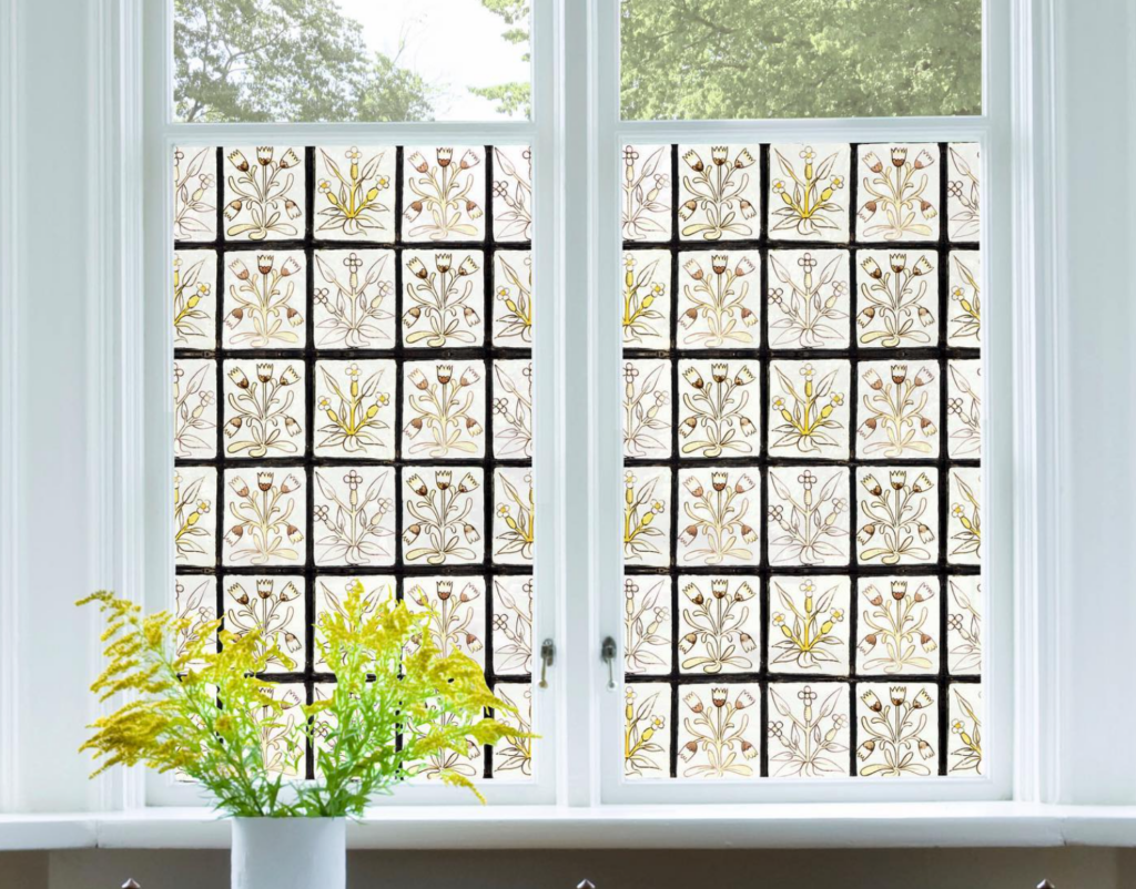 Tall French windows with yellow floral window film on the bottom half