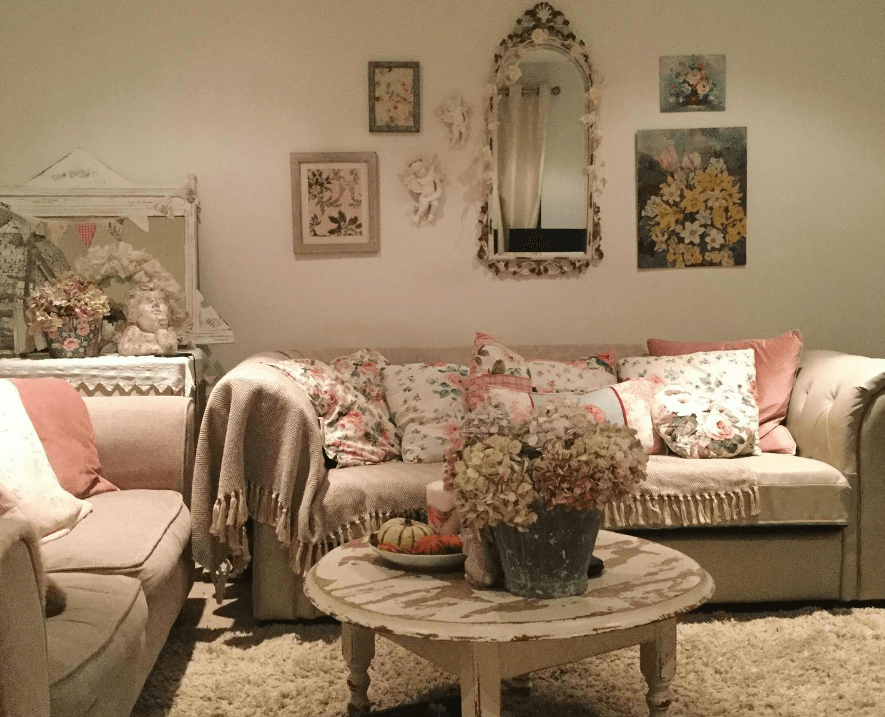 Cozy shabby-chic cottage-core living room with dimmed lighting