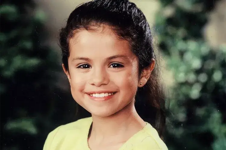 Selena Gomez as a child, smiling