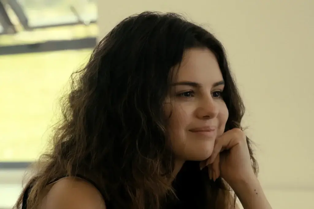 Selena Gomez smiling in her Apple TV+ documentary, "My Mind and Me"