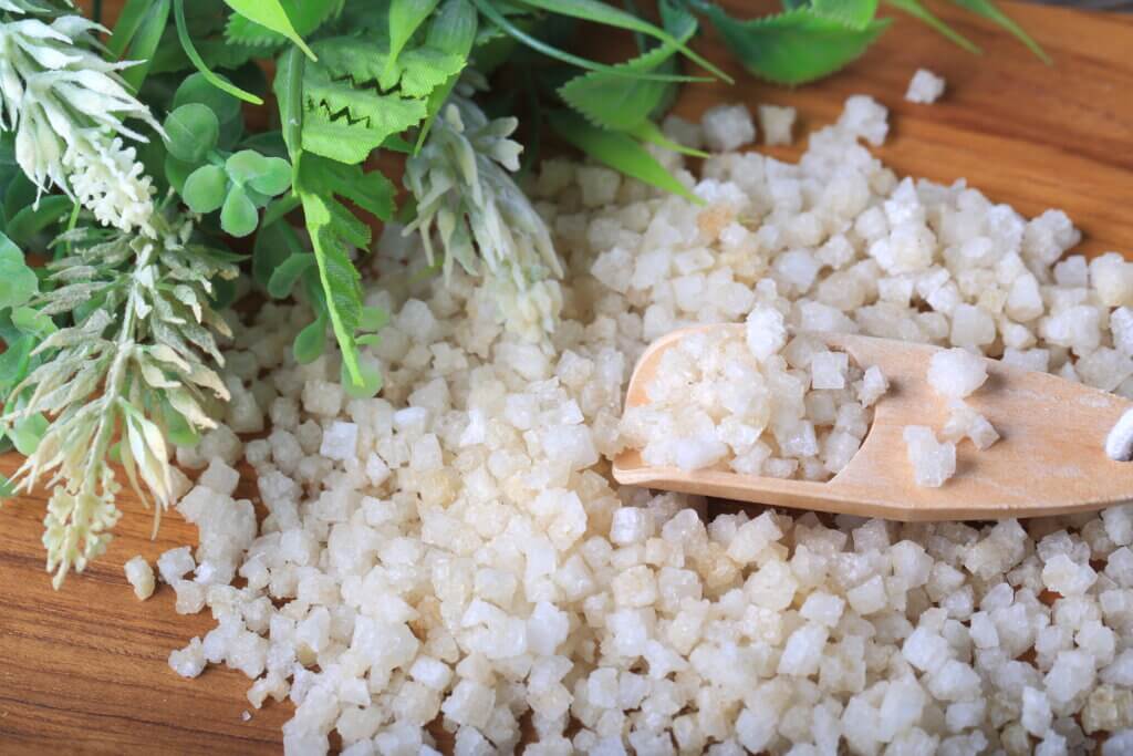 Epsom bath salt on wooden board