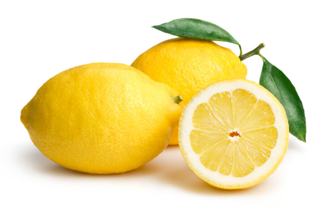 Ripe lemons on white background