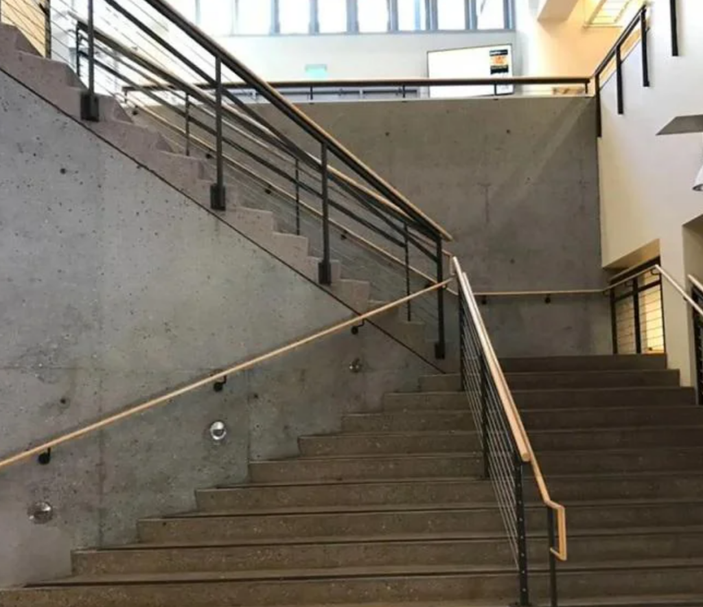 Commercial interior staircase badly DIYed with inaccessible area