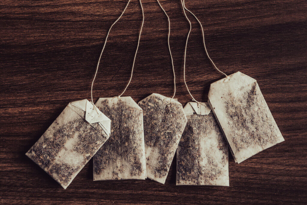 Tea-bags on walnut background