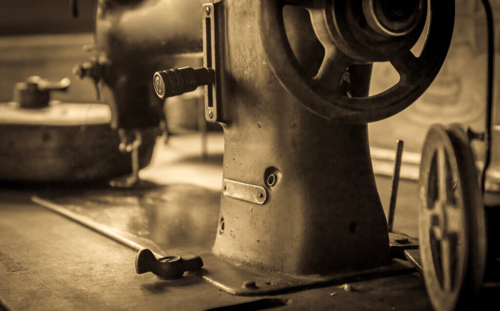 Sepia tone photo of vintage german sewing machine