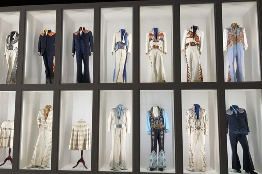 14 Elvis Flashy jumpsuits on display 