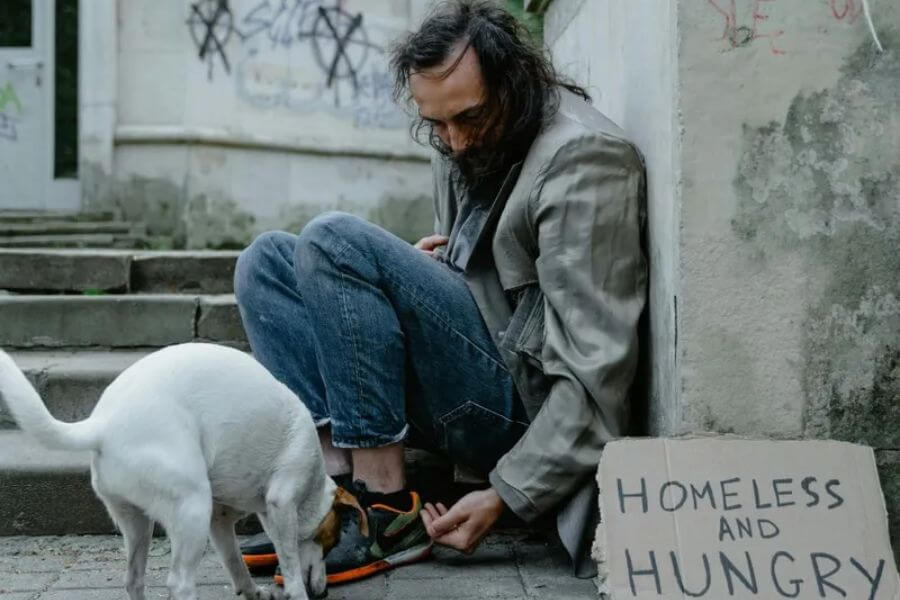 homeless man with his dog