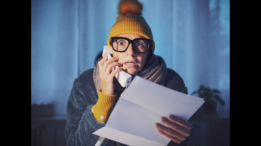 Woman terrified on a phone call.