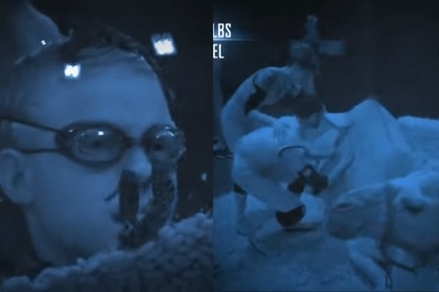 
The image shows contestants participating in a total black-out, fear-based challenge. One contestant, wearing goggles, faces close contact with frogs on his face, while another interacts with a camel in a dark, unsettling environment. The setup emphasizes fear and discomfort, testing contestants' bravery and endurance in a variety of creepy and intense scenarios.