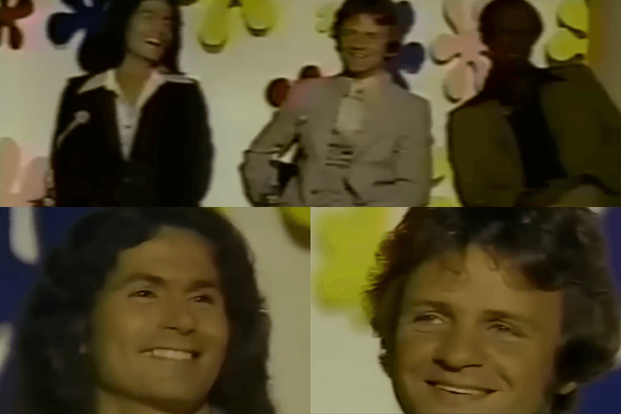 
The image is a collage of three frames from an episode of The Dating Game, highlighting the male contestants.

Top Frame: Three contestants are seen standing and smiling on stage, each dressed in typical 1970s fashion. The background is decorated with colorful floral designs, and the contestants appear relaxed and cheerful, enjoying the lighthearted atmosphere of the show.

Bottom Left Frame: A close-up of one contestant, likely Rodney Alcala, who is smiling confidently. His expression appears charming, hiding the dark reality of his true identity.

Bottom Right Frame: A close-up of another contestant, also smiling warmly. His expression, like the others, contributes to the show’s cheerful ambiance.