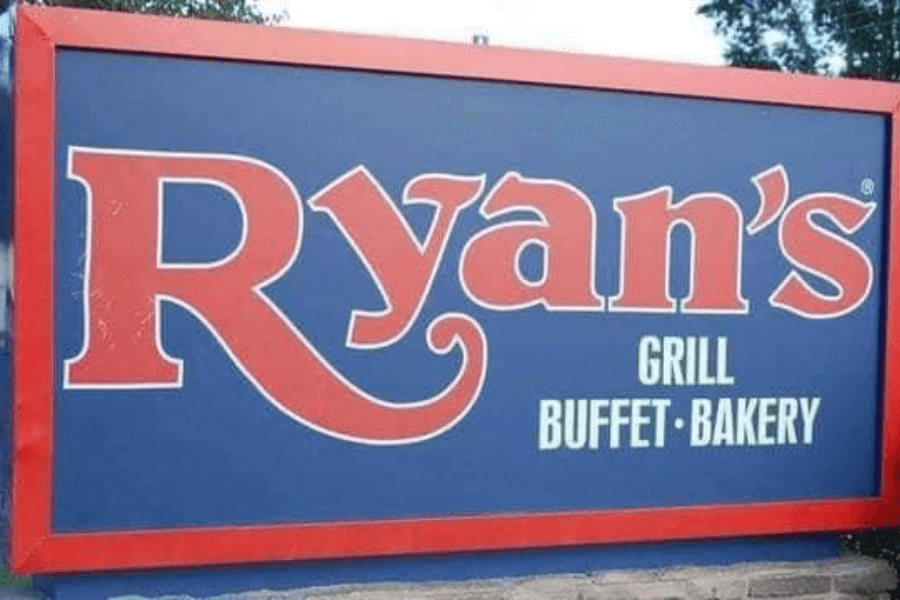 The image shows a Ryan's Grill, Buffet, and Bakery sign with bold red and white lettering on a blue background, evoking nostalgia for its famous buffet-style dining and homestyle meals.