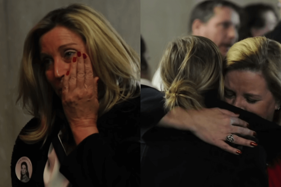 The image shows two emotional moments of a woman reacting strongly, likely during a courtroom or public setting. On the left, she appears visibly affected, holding her hand to her face, perhaps in disbelief or sorrow, her expression showing deep pain or distress. A small pin on her clothing bears an image of another person, possibly someone she is commemorating or seeking justice for. On the right, she is seen embracing another individual, both of them clearly emotional as they hold each other tightly, conveying a moment of shared grief, support, or relief.