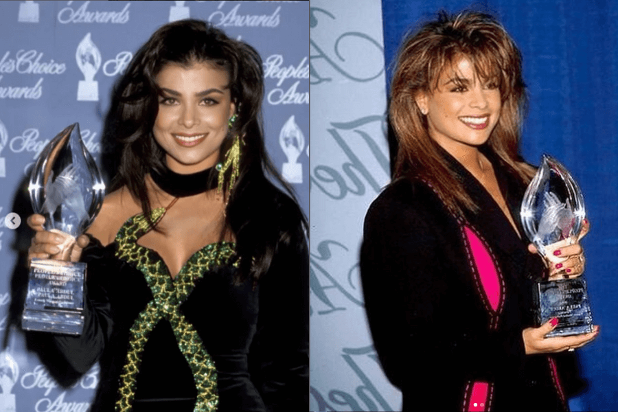 The photo shows Paula Abdul holding People's Choice Awards trophies; she's wearing a black and green embellished gown with gold accessories, and in the next photo, dressed in a dark blazer with pink accents, she was smiling brightly against event backdrops.