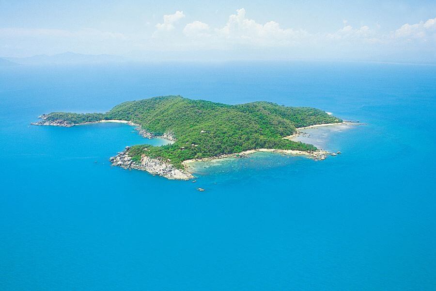 aerial view of an island in the middle of the ocean