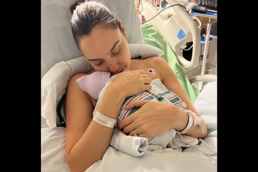 Gal Gadot holding her new born baby