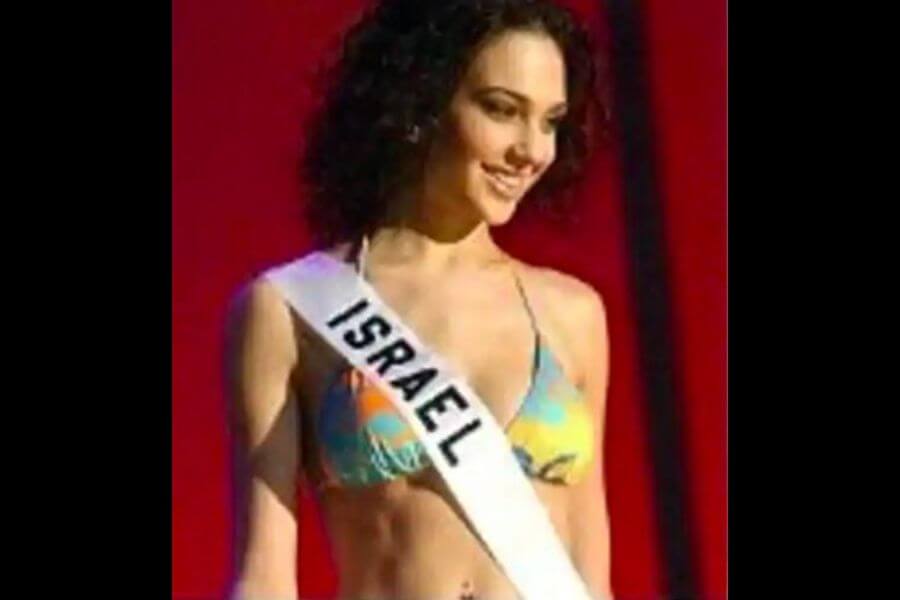 Young Gal Gadot waring a miss israel band