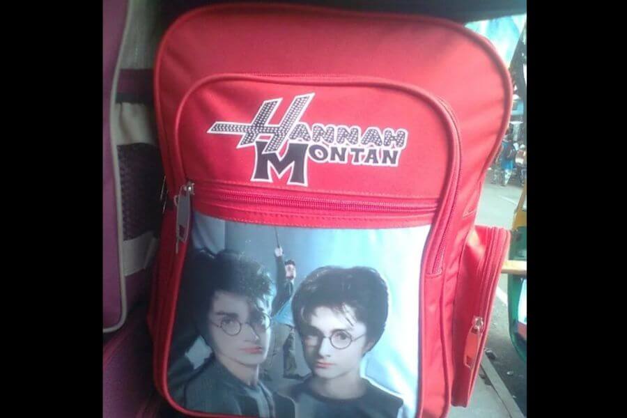 child size bag with poorly written text and harry potter print