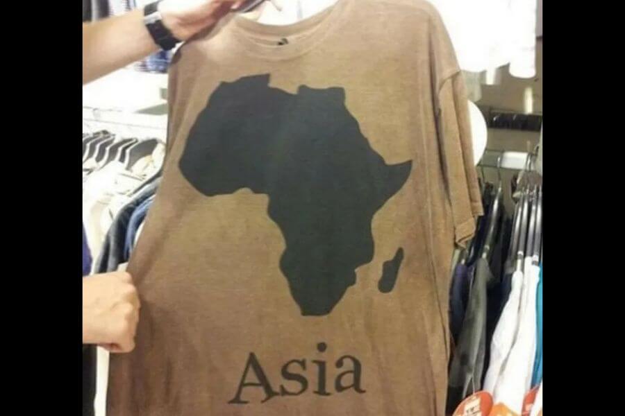 Green shirt with the african content printed and the text that says "Asia"