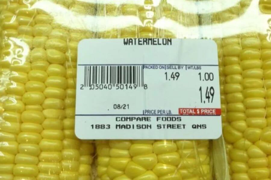 corn with a price tag that reads "watermelon"