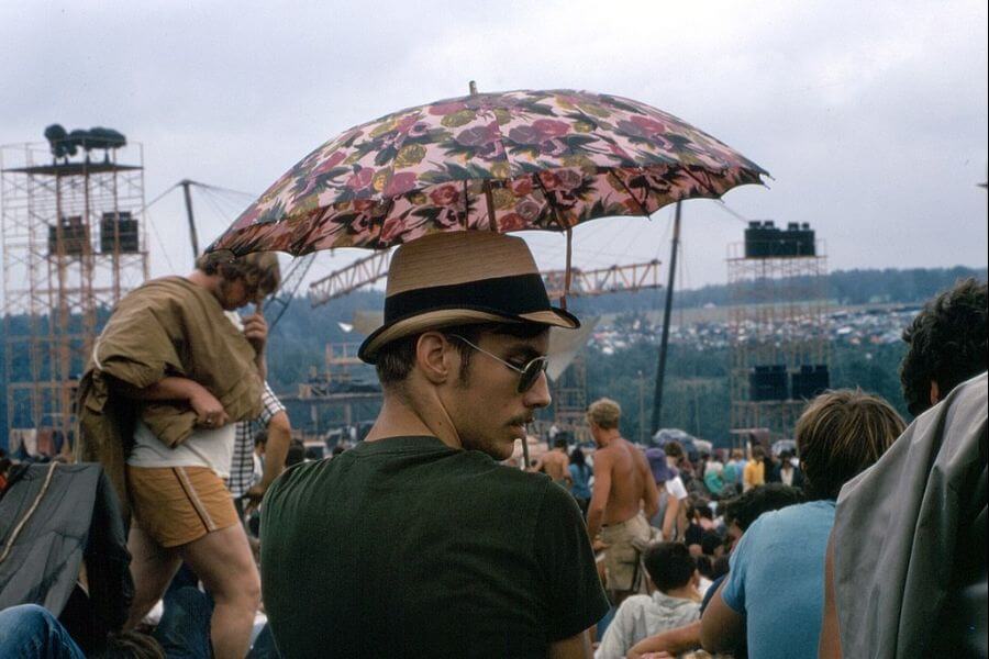 young man holding an umbrella 