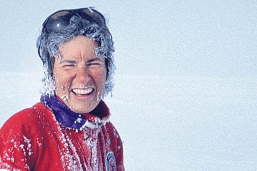 woman taking a selfie in the snow-covered landscape