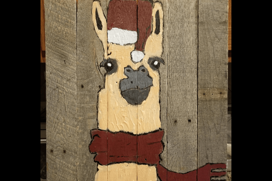 llama painted on a fence