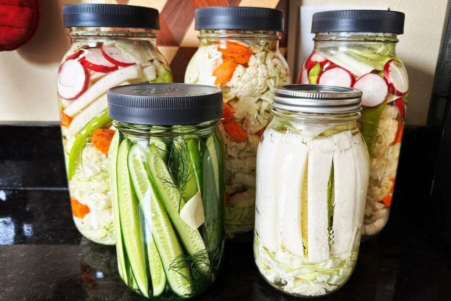 veggies inside water jars