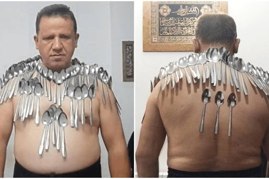 The image shows a man demonstrating a unique skill or feat involving magnetic or adhesive properties. In a split view, the man is shirtless, with dozens of metal spoons adhered to his chest, shoulders, and back. The setting appears to be a home environment, with framed artwork featuring Arabic script visible on the wall behind him.