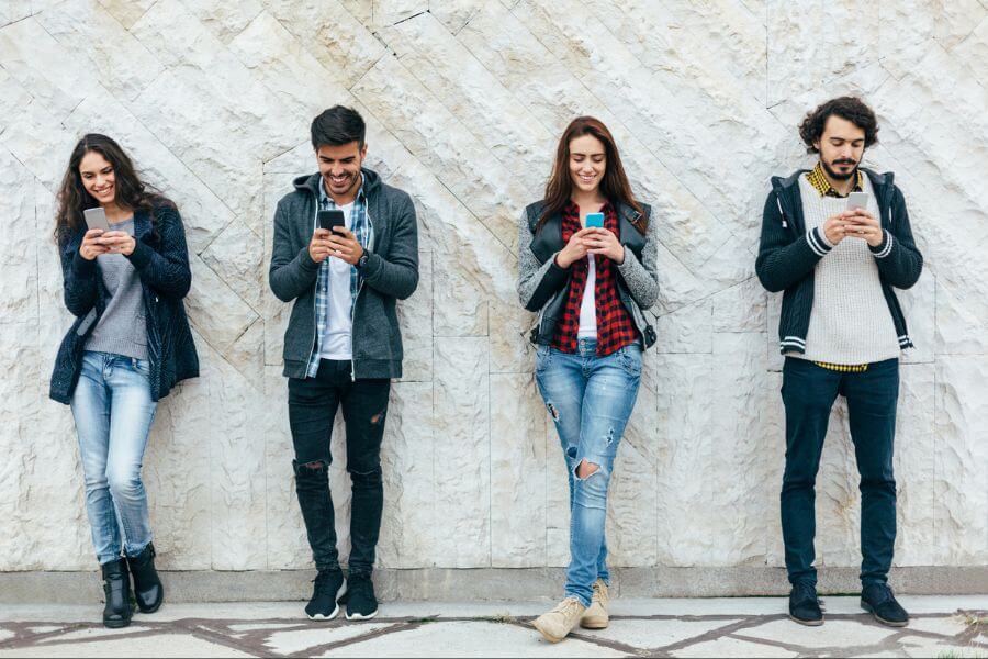Five people texting seperately