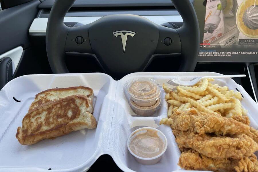 chicken and waffles inside a car