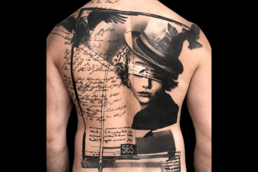 A dramatic full-back tattoo featuring a collage of surrealist elements. The design includes a blindfolded woman in a hat, vintage script, two black crows, and abstract shapes with contrasting shadows and highlights.