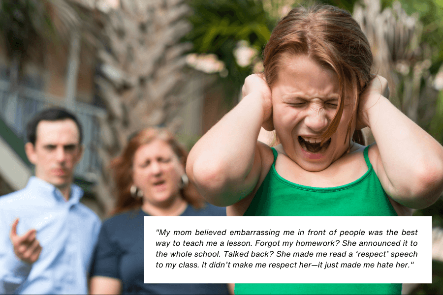 A young girl in a green tank top covers her ears with her hands, grimacing in distress, while two adults in the background, a man and a woman, appear to be scolding her. The setting is outdoors, with blurred palm trees and a building in the background. Below the image, text reads: "My mom believed embarrassing me in front of people was the best way to teach me a lesson. Forgot my homework? She announced it to the whole school. Talked back? She made me read a ‘respect’ speech to my class. It didn’t make me respect her—it just made me hate her."