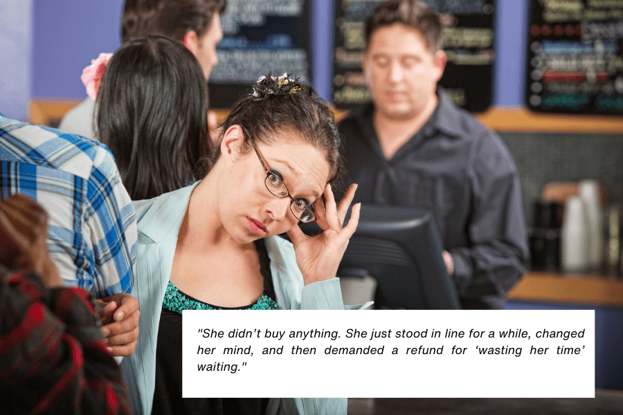 This image shows a woman with glasses looking annoyed, standing in a line at what appears to be a coffee shop or café. The background includes a cashier at the counter and a menu board on the wall. The quote in the image reads: "She didn’t buy anything. She just stood in line for a while, changed her mind, and then demanded a refund for ‘wasting her time’ waiting."