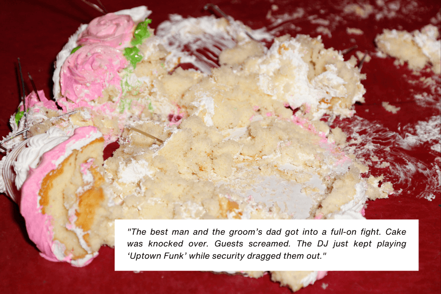 A smashed wedding cake with pink and white frosting lies in disarray on a red surface, suggesting a chaotic event. A caption describes a fight between the best man and the groom’s father that led to the cake being knocked over, while the DJ played "Uptown Funk" and security intervened.