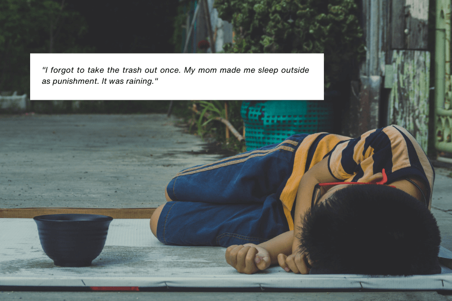 A young boy lies curled up on a mat outside, wearing a striped shirt and jeans. A bowl sits nearby on the wet ground, and the surrounding environment appears damp, suggesting it has been raining. Below the image, text reads: "I forgot to take the trash out once. My mom made me sleep outside as punishment. It was raining."