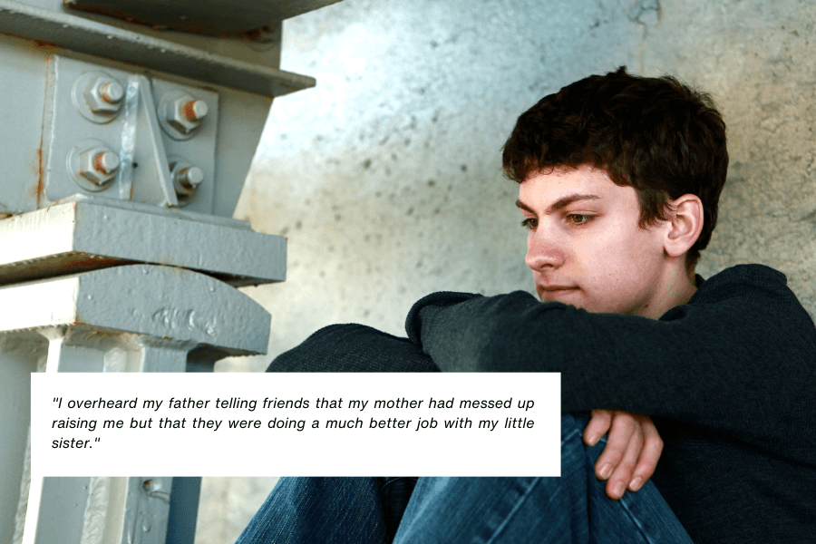 A teenage boy sits alone under a metal structure, resting his arms on his knees and gazing off to the side with a pensive expression. The background is industrial and muted, reflecting a somber mood. Below the image, text reads: "I overheard my father telling friends that my mother had messed up raising me but that they were doing a much better job with my little sister."