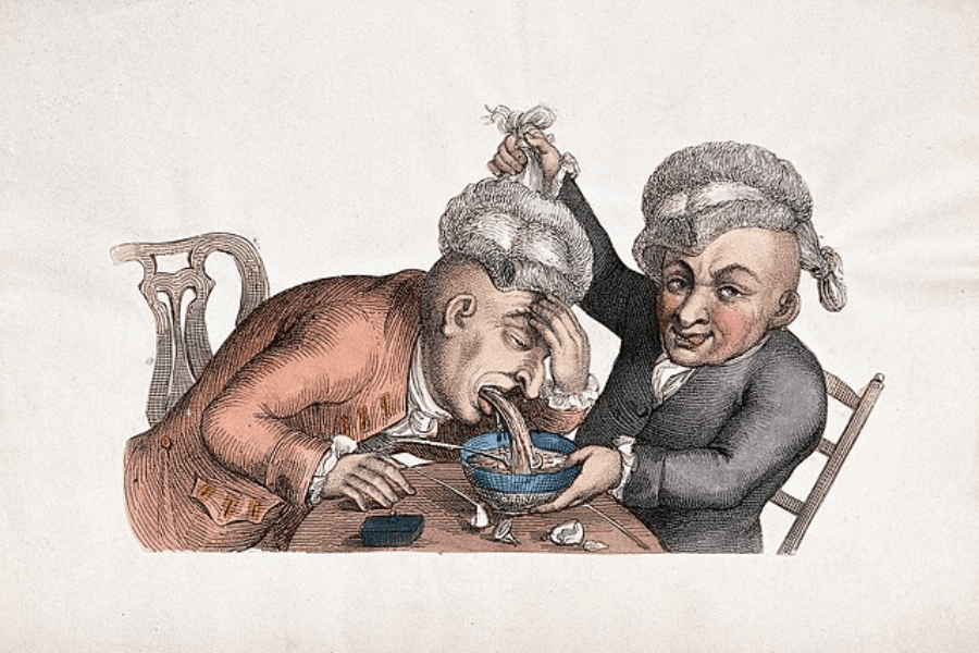 A satirical 18th or 19th-century illustration depicting two men in powdered wigs engaged in a grotesque scene. One man, dressed in a red coat, appears to be vomiting noodles into a bowl while holding his head in distress. The other, in a dark coat, holds up the first man's wig with an amused expression, as if playfully assisting in the act. The exaggerated facial features and absurd situation suggest this is a political or social caricature.