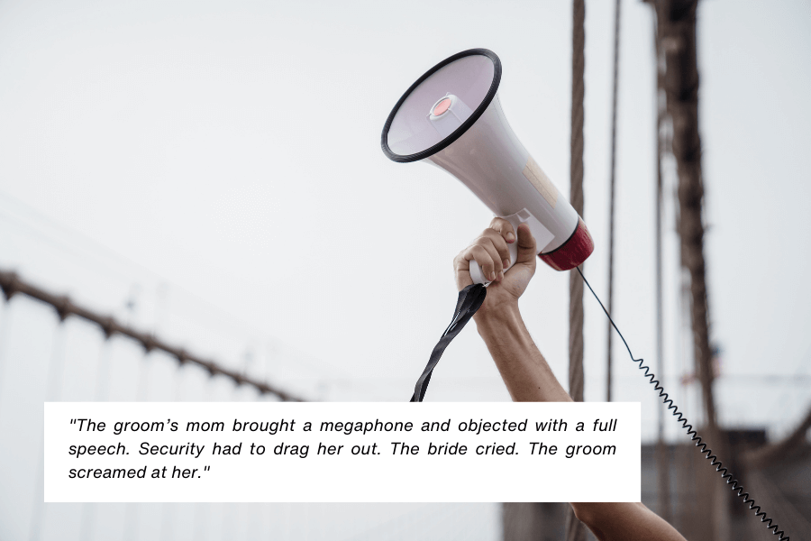 A person raises a megaphone in the air against an outdoor backdrop with blurred structures in the background. A caption narrates how the groom’s mother used a megaphone to object to the wedding, leading to security removing her while the bride cried and the groom yelled at her.