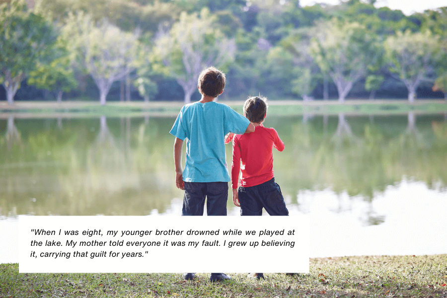 Two children stand by a lake, one wearing a blue shirt and the other a red shirt, with the child in blue placing an arm around the other’s shoulder. The serene background features trees and their reflection in the water. Below the image, text reads: "When I was eight, my younger brother drowned while we played at the lake. My mother told everyone it was my fault. I grew up believing it, carrying that guilt for years."