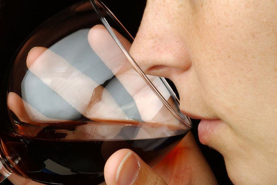 woman drinking wine
