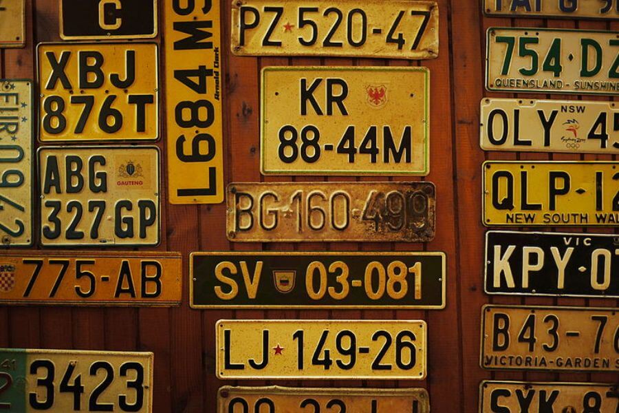 car plates on wall